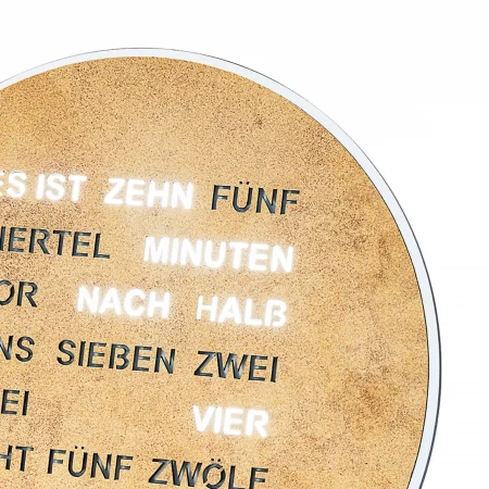 Detailaufnahme einer Wortuhr ohne Zeiger