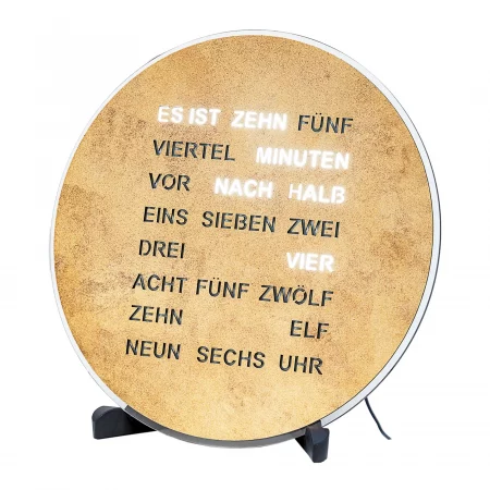 Runde Uhr ohne Zeiger mit leuchtenden Buchstaben auf hellem Hintergrund